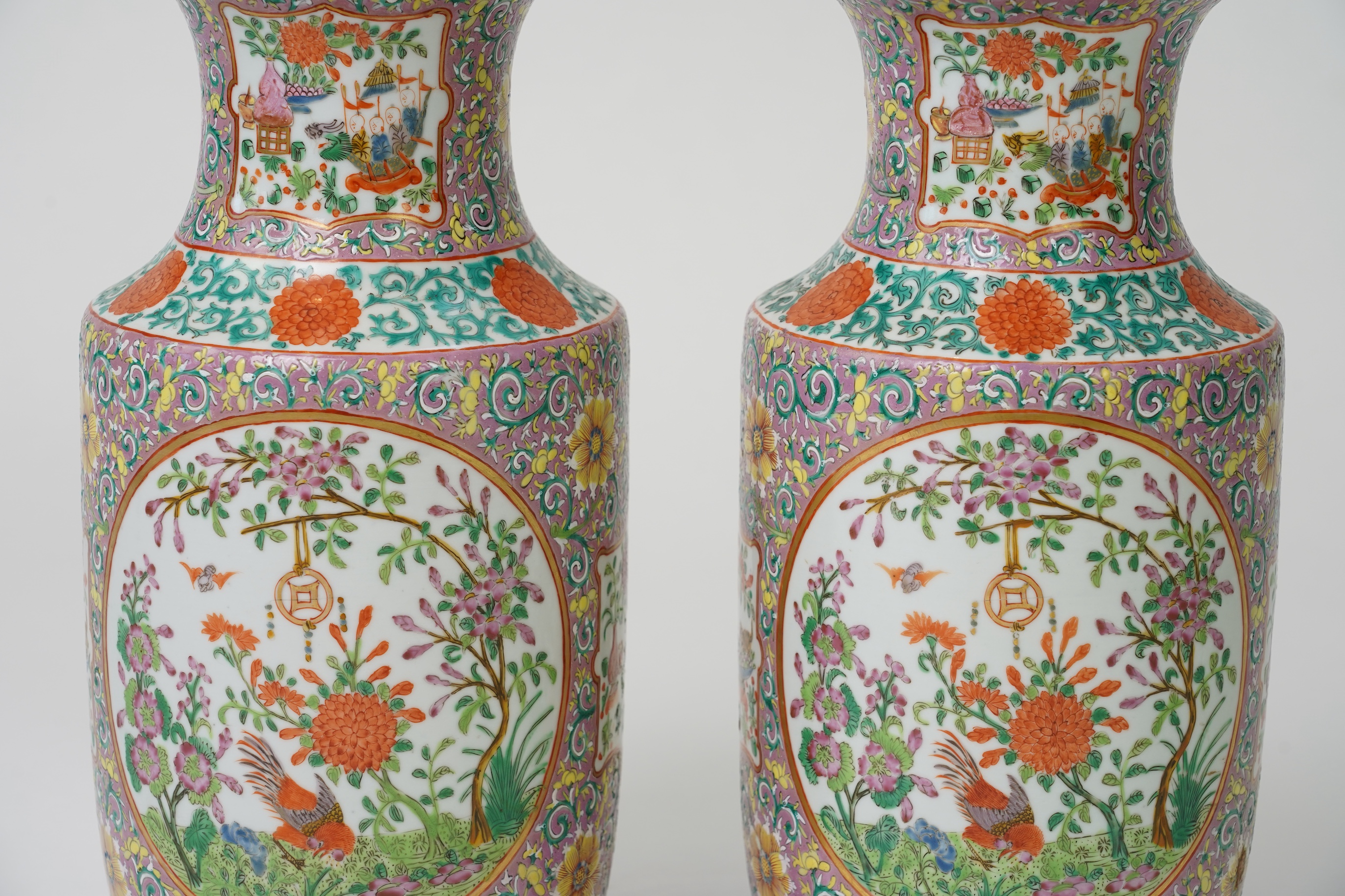 A pair of Chinese famille rose vases, early 20th century